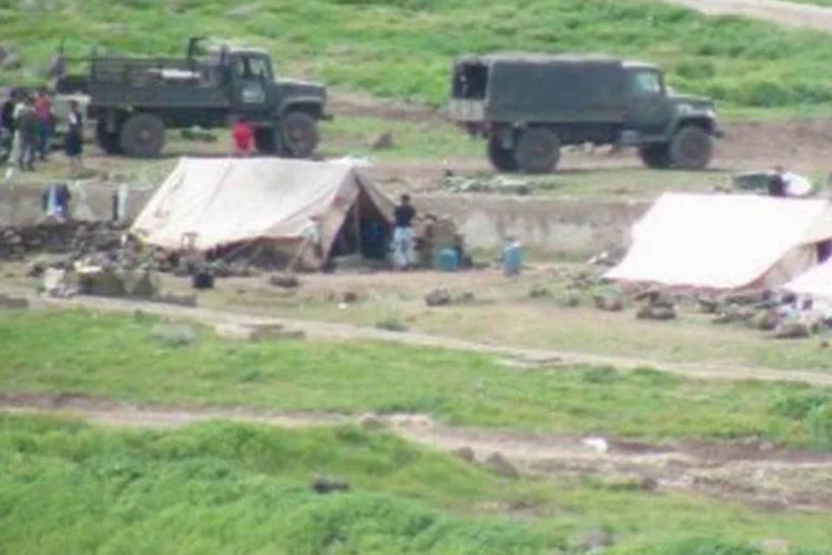 Foto divulgada pela oposição mostra acampamento do Exército sírio em Homs: quase 30% da chamada "capital da revolução" está fora do controle do Exército, afirma a oposição (Shaam News Network/AFP)