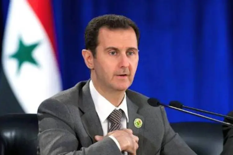 
	O presidente s&iacute;rio, Bashar al-Assad: diversos pa&iacute;ses que se op&otilde;em a Assad, incluindo a Fran&ccedil;a, proibiram a vota&ccedil;&atilde;o
 (AFP)