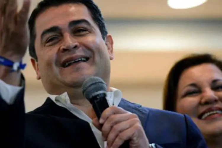 
	Juan Orlando Hern&aacute;ndez, eleito presidente de Honduras:&nbsp;Hern&aacute;ndez&nbsp;assumiu nesta segunda-feira o cargo para um per&iacute;odo de quatro anos
 (Orlando Sierra/AFP)