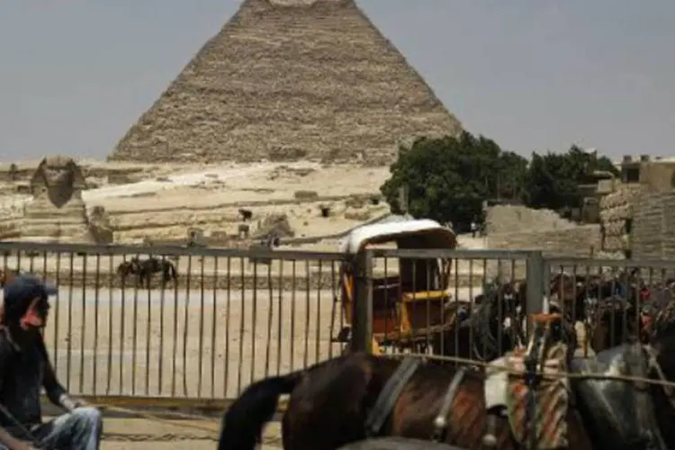 
	Pir&acirc;mides no Egito: receitas do turismo no Egito em 2013 alcan&ccedil;aram 5,9 bilh&otilde;es de d&oacute;lares
 (Gianluigi Guercia/AFP)