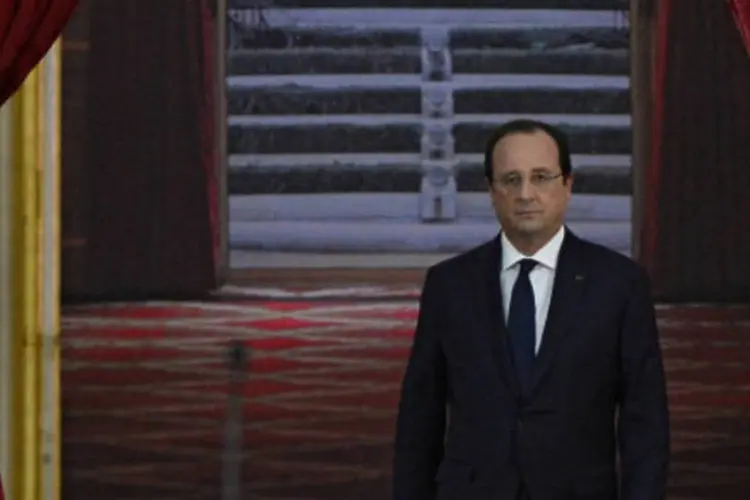 O presidente da França, François Hollande: visivelmente tenso, ele começou a conferência de imprensa no Palácio do Eliseu falando sobre a crise financeira (AFP/Getty Images)