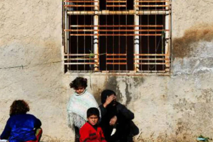Crianças sírias refugiadas, na fronteira da Síria com a Turquia: ONG havia negado as acusações contra sua organização (Ozan Kose/AFP)