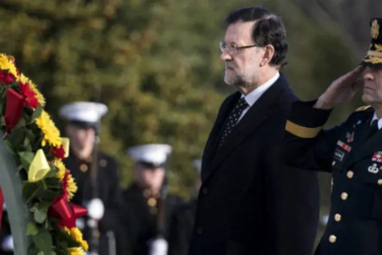 Mariano Rajoy, presidente espanhol, durante cerimônia em homenagem a soldados americanos: jazem no cemitério 300 mil soldados americanos (AFP/Getty Images)