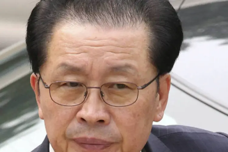 
	Jang Song-thaek, tio do l&iacute;der Kim Jong-un:&nbsp;di&aacute;rio de Hong Kong publicou que Jan Song-Thaek tinha sido devorado em uma jaula por uma matilha
 (China Daily/File/Reuters)