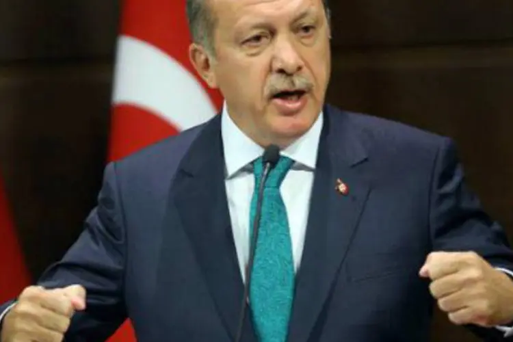
	Tayyp Erdogan: em seus tr&ecirc;s mandatos, Erdogan, um pol&iacute;tico de tend&ecirc;ncias isl&acirc;micas, transformou a Turquia, reduzindo o papel das For&ccedil;as Armadas laicas e comandando uma r&aacute;pida expans&atilde;o econ&ocirc;mica
 (Adem Altan/AFP)