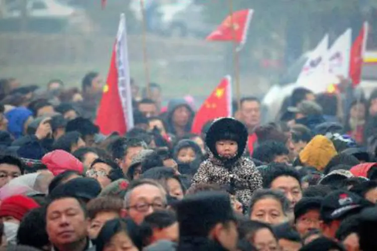 Chineses celebram o 120º aniversário do nascimento de Mao Tsé-Tung: autoridades ordenaram a redução das despesas (Wang Zhao/AFP)