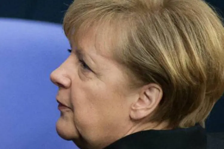 Angela Merkel: "não podemos permanecer imóveis em um mundo que muda permanentemente", disse (David Gannon/AFP)