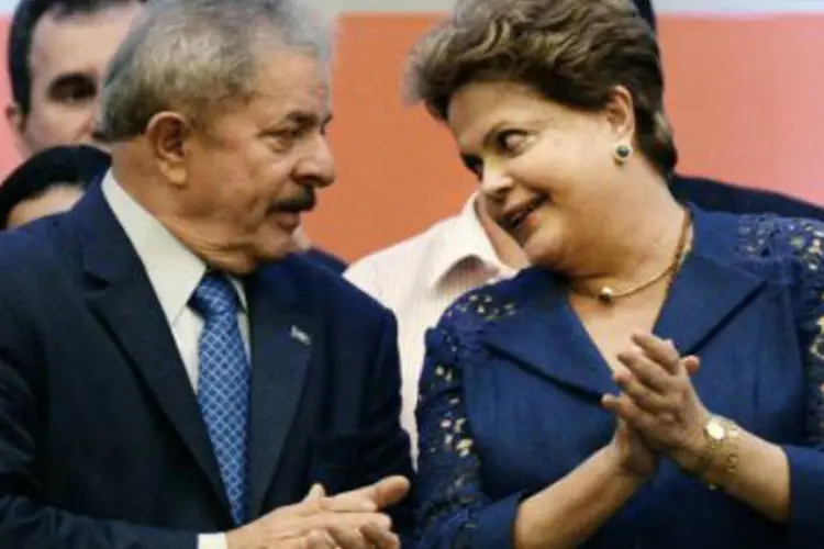 A presidente Dilma Rousseff e o ex-presidente Luiz Inácio Lula da Silva: "Lula conseguiu realizar o governo de mais êxito do Brasil", disse Dilma (Evaristo Sá/AFP)