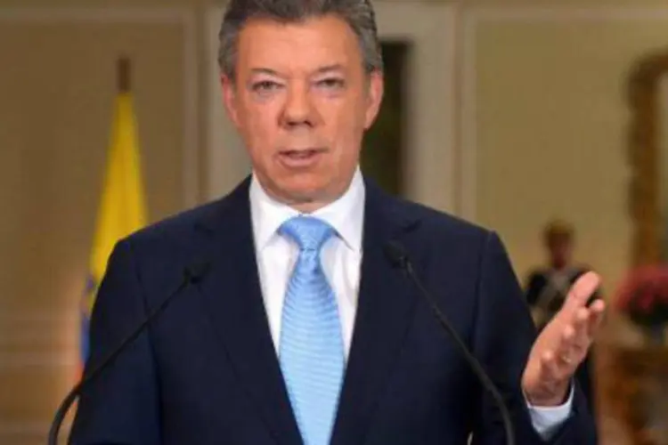 
	Presidente da Col&ocirc;mbia, Juan Manuel Santos: presidente passou de 27% das inten&ccedil;&otilde;es de votos no levantamento anterior, para 38,5%
 (Andres Piscov/AFP)