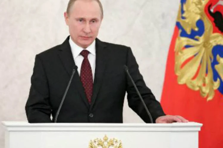 O presidente russo, Vladimir Putin, em discurso: "não impomos nada a ninguém", disse (Mikhail Metzel/AFP)