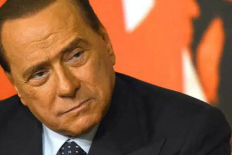 
	O ex-primeiro-ministro italiano Silvio Berlusconi: &quot;n&atilde;o, tenho certeza que eles n&atilde;o podem [me prender], se n&atilde;o haver&aacute; uma revolu&ccedil;&atilde;o na It&aacute;lia.&quot;&nbsp;
 (Gabriel Bouys/AFP)