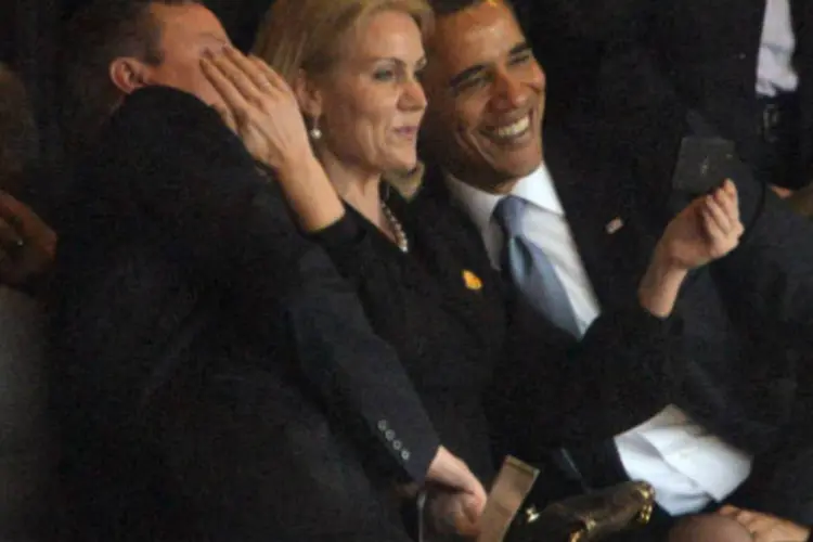 Selfie de Barack Obama, com David Cameron e Helle Thorning-Schmidt: fotógrafo disse que apenas pensou que os líderes "estavam se comportando como seres humanos" (Getty Images)