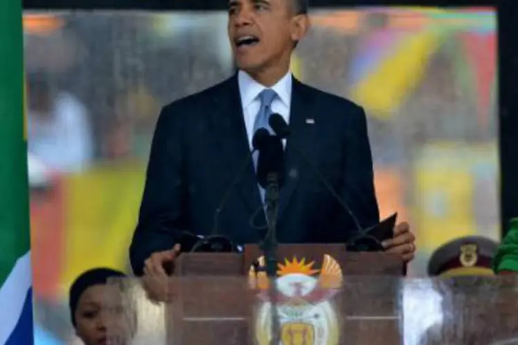 Obama discursa durante a cerimônia em homenagem a Mandela: Obama apontou Mandela como exemplo de como as pessoas podem alcançar uma mudança (Alexander Joe/AFP)