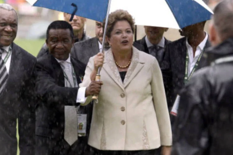 
	Dilma Rousseff chega a cerim&ocirc;nia religiosa em homenagem a Nelson Mandela: &quot;Madiba constituiu exemplo e refer&ecirc;ncia para todos n&oacute;s&quot;, disse
 (Getty Images)
