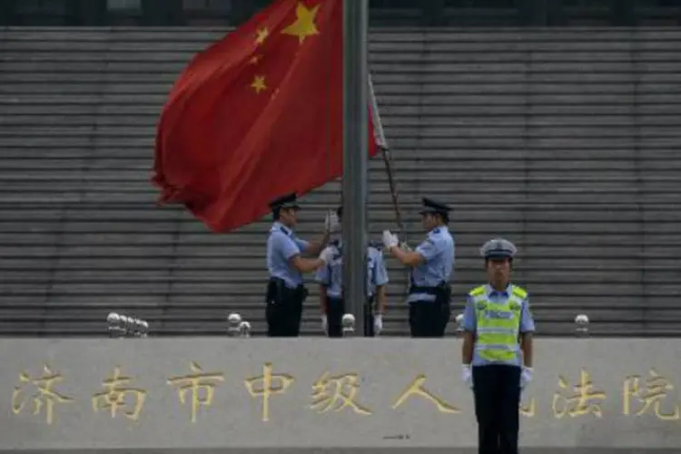 
	Bandeira da China:&nbsp;China&nbsp;&quot;&eacute; um Estado de Direito e todos os cidad&atilde;os s&atilde;o iguais perante a lei&quot;, disse&nbsp;porta-voz
 (Mark Ralston/AFP)