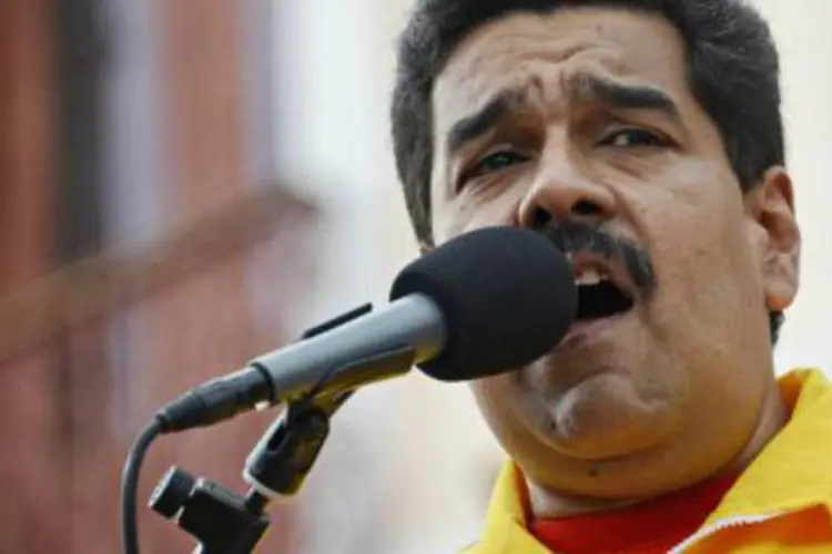 
	Nicol&aacute;s Maduro: Maduro aprovou modifica&ccedil;&atilde;o parcial na lei de Crimes Cambiais, para flexibilizar processo de abertura de contas em moeda estrangeira em bancos venezuelanos
 (Leo Ramirez/AFP)
