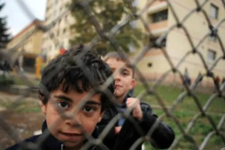 Crianças sírias em um campo de refugiados: elas respondem por metade dos 2,2 milhões de refugiados sírios (Nikolay Doychinov/AFP)