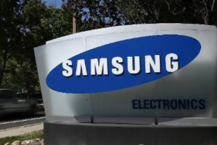 
	Samsung: companhia n&atilde;o faz segredo de que continuar&aacute; agressiva no marketing ao tentar manter sua marca t&atilde;o desejada quanto a da Apple
 (Justin Sullivan/AFP)
