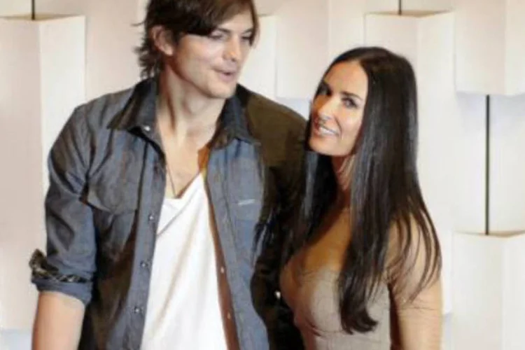 Ashton Kutcher e Demi Moore em 2011: ambas as partes recuperaram seu estado civil de solteiros, segundo documentos (Mauricio Lima/AFP)