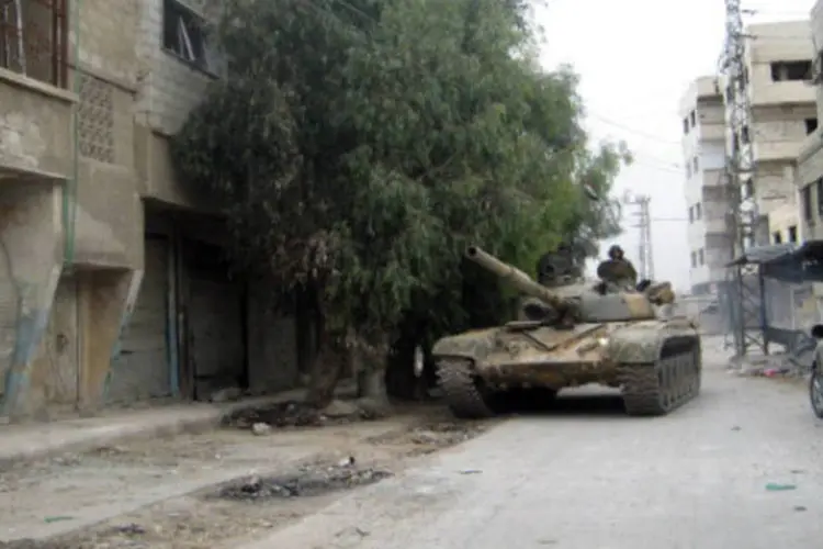 Tanque do Exército Sírio: combates aconteceram onde funcionava a sede da brigada governamental que protegia o aeroporto de Alepo (Getty Images)