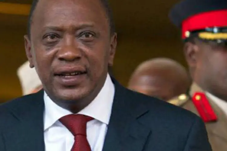 O ex-presidente queniano Uhuru Kenyatta: julgamento devia começar em 12 de novembro (Andrew Cowie/AFP)