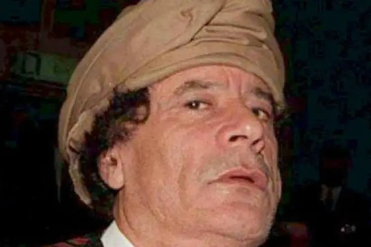 O ex-ditador líbio Muammar Kadafi, em 1996: data do julgamento ainda será determinada (Manoocher Deghati/AFP)