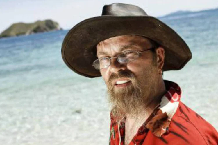 Robert Nielsen, em um programa de TV: Robert vende camisas com a frase "Desempregado e orgulhoso" (Jeppe Bjoern Vejloe/AFP)
