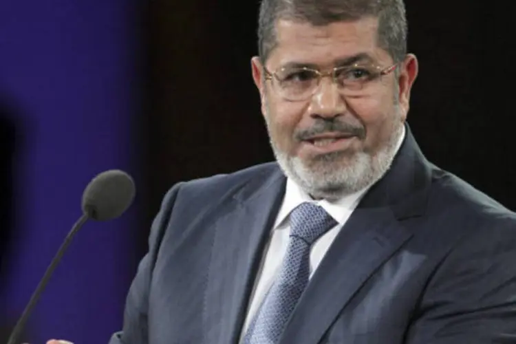 
	Mohamed Morsi: presidente deposto do Egito j&aacute; cumpria pena de 20 anos por acusa&ccedil;&otilde;es de liga&ccedil;&atilde;o com a morte de manifestantes
 (Jin Lee/Bloomberg)