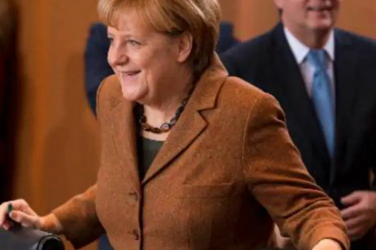 A chanceler alemã, Angela Merkel: quase um mês depois das eleições, os líderes dos partidos selaram um acordo em sua terceira rodada de negociações exploratórias (John Macdougall/AFP)