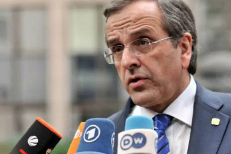 
	Antonis Samaras: presidente da Comiss&atilde;o Europeia, Jean-Claude Juncker, deve se encontrar nesta segunda-feira com o ex-premi&ecirc; grego
 (Georges Gobet/AFP)