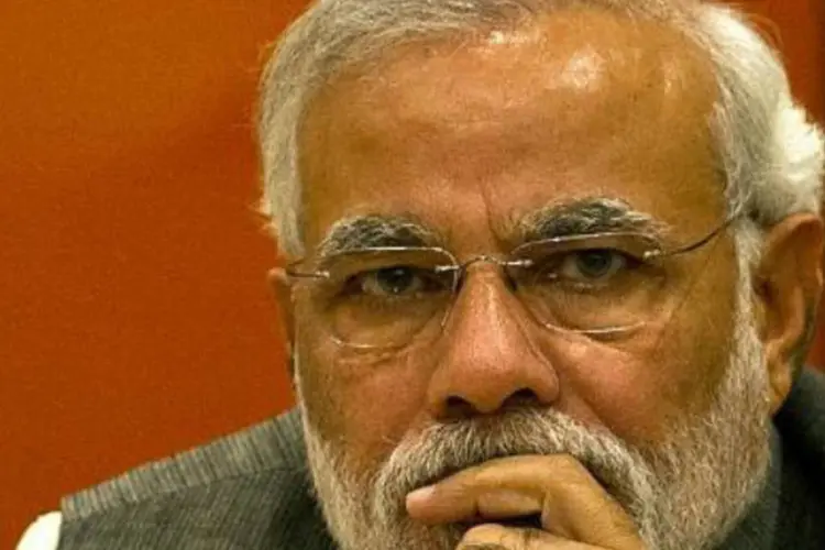 
	Narendra Modi: na contagem de votos ficou claro que Modi estava caminhando para impressionante vit&oacute;ria
 (Manan Vatsyayana/AFP)