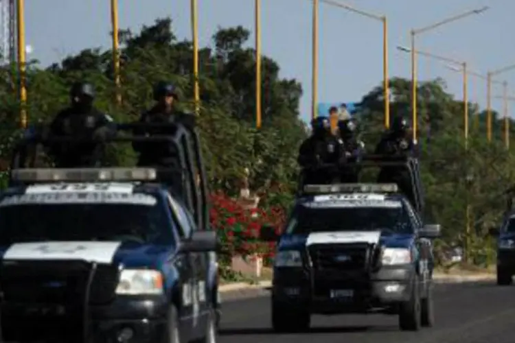 Forças federais mexicanas no estado de Michoacán: na segunda-feira à noite milhares de policiais e soldados foram enviados para Michoacán para desarmar os milicianos (Hector Guerrero/AFP)