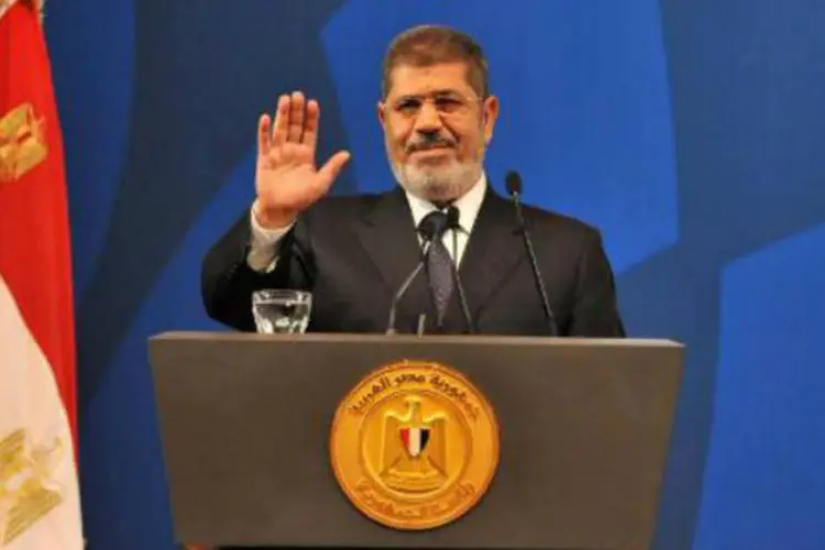 O presidente deposto do Egito, Mohamed Mursi em 29 de maio de 2013: Mursi está preso e sendo julgado por "incitação ao assassinato" de manifestantes  (AFP)