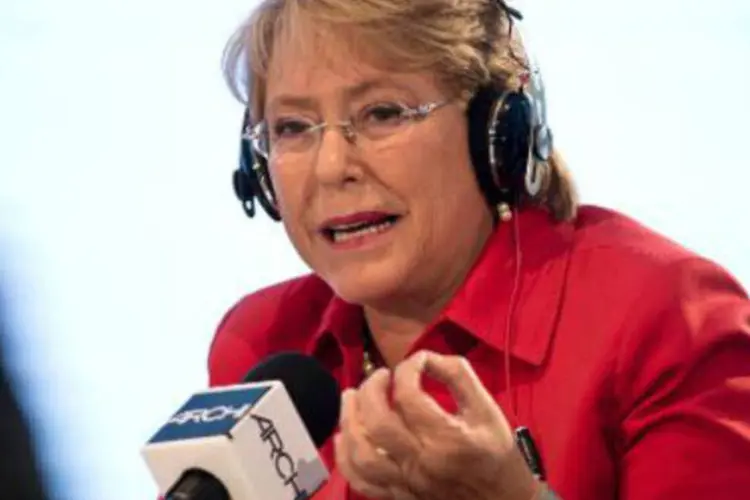 
	Michelle Bachelet: perante os rumores jornal&iacute;sticos sobre sua poss&iacute;vel ren&uacute;ncia, a presidente assinalou que &quot;isso seria uma quebra institucional&quot;
 (Martin Bernetti/AFP)