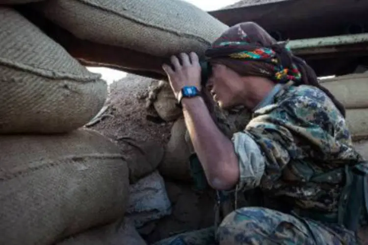 Combatente de Comitê de Proteção do Povo Curdo: combates entre curdos e jihadistas aconteceram em várias localidades (Alice Martins/AFP)