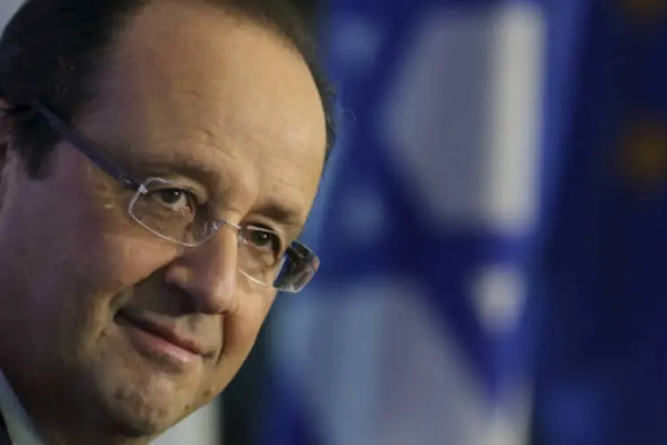 
	Fran&ccedil;ois Hollande, presidente da Fran&ccedil;a:&nbsp;&quot;podemos elevar o n&iacute;vel das san&ccedil;&otilde;es se n&atilde;o houver uma solu&ccedil;&atilde;o&quot;
 (Philippe Wojazer/Reuters)