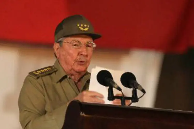 
	Presidente cubano Ra&uacute;l Castro: nova lei foi aprovada com &quot;o voto un&acirc;nime dos deputados cubanos&quot; numa sess&atilde;o de car&aacute;ter extraordin&aacute;rio do Parlamento
 (Alejandro Ernesto/AFP)