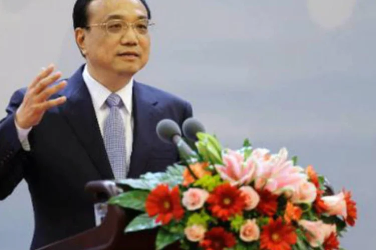 
	Primeiro-ministro chin&ecirc;s, Li Keqiang: premi&ecirc; reiterou que o governo chin&ecirc;s tem a capacidade e a confian&ccedil;a para manter o crescimento econ&ocirc;mico em um intervalo razo&aacute;vel
 (Jason Lee/AFP)
