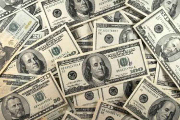 
	D&oacute;lares: de agosto a dezembro, o BC vendeu US$ 500 milh&otilde;es por dia no mercado futuro
 (Karen Bleier/AFP)
