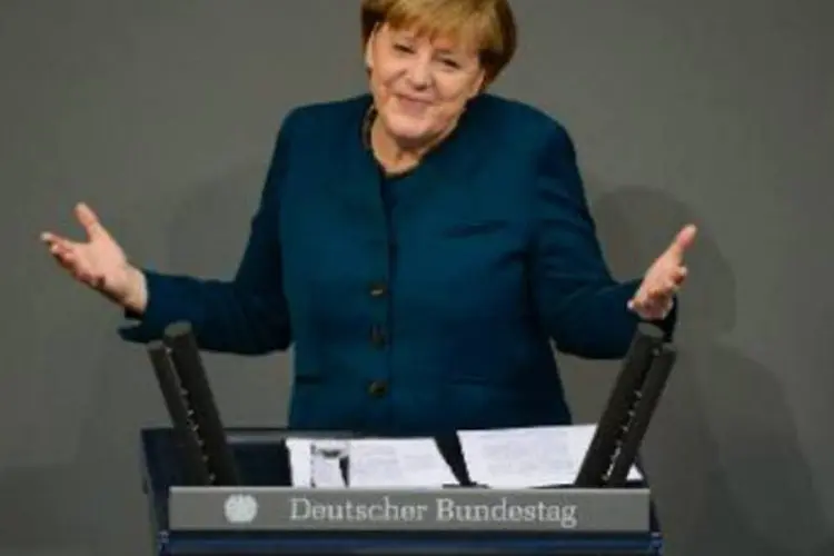 
	A chanceler alem&atilde;, Angela Merkel:Alemanha est&aacute; participando da crise na Ucr&acirc;nia
 (John Macdougall/AFP)