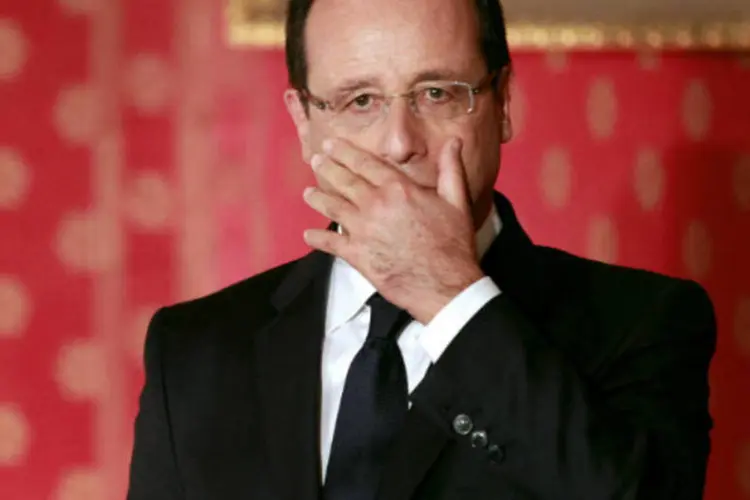 
	O presidente da Fran&ccedil;a, Fran&ccedil;ois Hollande: a S&amp;P tamb&eacute;m alertou para a inabilidade do governo para reduzir significativamente os gastos totais do governo
 (Pascal Pochard-Casabianca/Pool/Reuters)