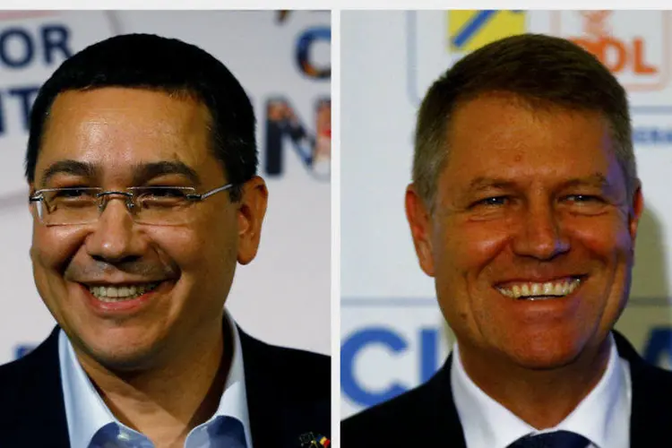 Fotos dos candidatos à presidência da Romênia, o primeiro-ministro Victor Ponta (E) e Klaus Iohannis (Bogdan Cristel/Reuters)