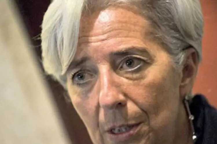 Merkel tem respeito por Christine Lagarde e gostaria dela na diretoria do FMI, para manter a tradição europeia no fundo (AFP)