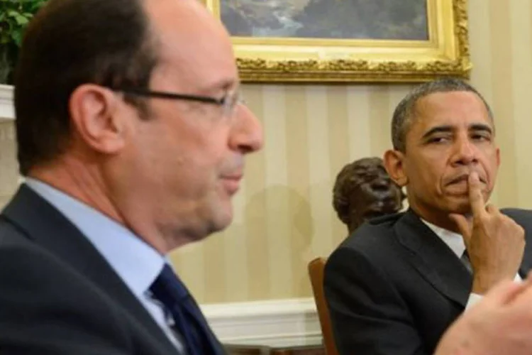 Quanto ao Afeganistão, Hollande explicou que lembrou a Obama a "promessa" que fez a seus compatriotas de retirar as tropas francesas no final deste ano (©AFP / Eric Feferberg)