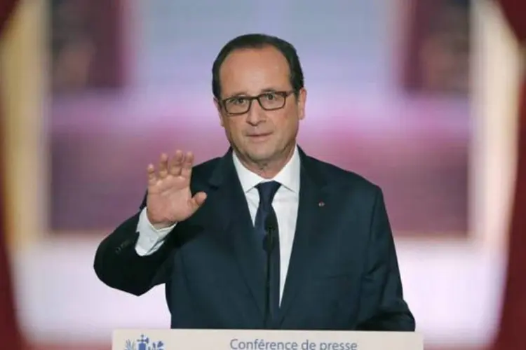 
	Hollande: &quot;farei tudo para fazer o maior crescimento poss&iacute;vel em 2015 e em 2016 para que possamos ter mais de 1 por cento&quot;
 (Christian Hartmann/Reuters)