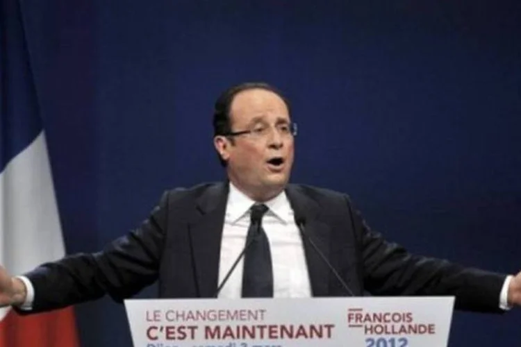 Hollande declarou que tinha a impressão de que a posição de Merkel "provoca um debate dentro de sua própria maioria" (Jeff Pachoud/AFP)