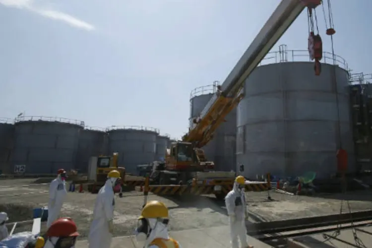 
	Fukushima: at&eacute; o momento, o governo central j&aacute; destinou mais de R$ 22 bilh&otilde;es para os trabalhos de limpeza e descontamina&ccedil;&atilde;o
 (Issei Kato/Pool via Bloomberg)