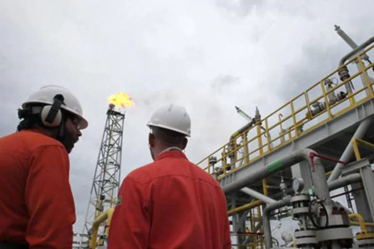 
	Funcion&aacute;rios da Petrobras: para o gestor da BlackRock, a alta das a&ccedil;&otilde;es refletiu a maior capacidade de a companhia pagar dividendos
 (REUTERS/Sergio Moraes)
