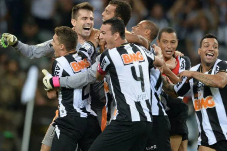Jogadores do Atlético Mineiro comemoram título da Taça Libertadores da América (AFP / Vanderlei Almeida)