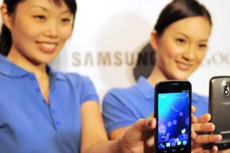 
	O smartphone Galaxy Nexus: a&nbsp;decis&atilde;o do tribunal de apela&ccedil;&atilde;o &eacute; uma clara vit&oacute;ria para a Samsung, que agora pode manter seus produtos nas prateleiras das lojas dos EUA
 (Laurent Fievet/AFP)